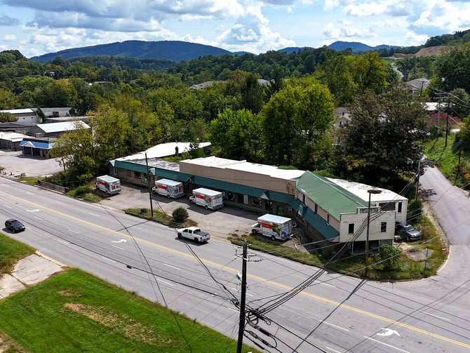 Front corner of the building along Smokey Park Hwy